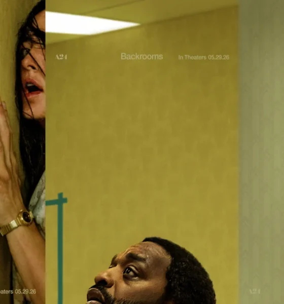 Promotional image for *Backrooms* (A24, in theaters 05.29.26), created by combining three official one-sheet posters into a single widescreen composite. Left panel: a woman with dark hair presses her hand against a yellow-green institutional wall, mouth open in terror, her face partially obscured as she peers around a corner. Center panel: the same yellow-green environment, nearly empty, with a small teal barrier visible — stark and unsettling. Right panel: a man looks upward with a fearful expression against a pale institutional wall. The Horrortainment News logo appears in the lower right corner.
